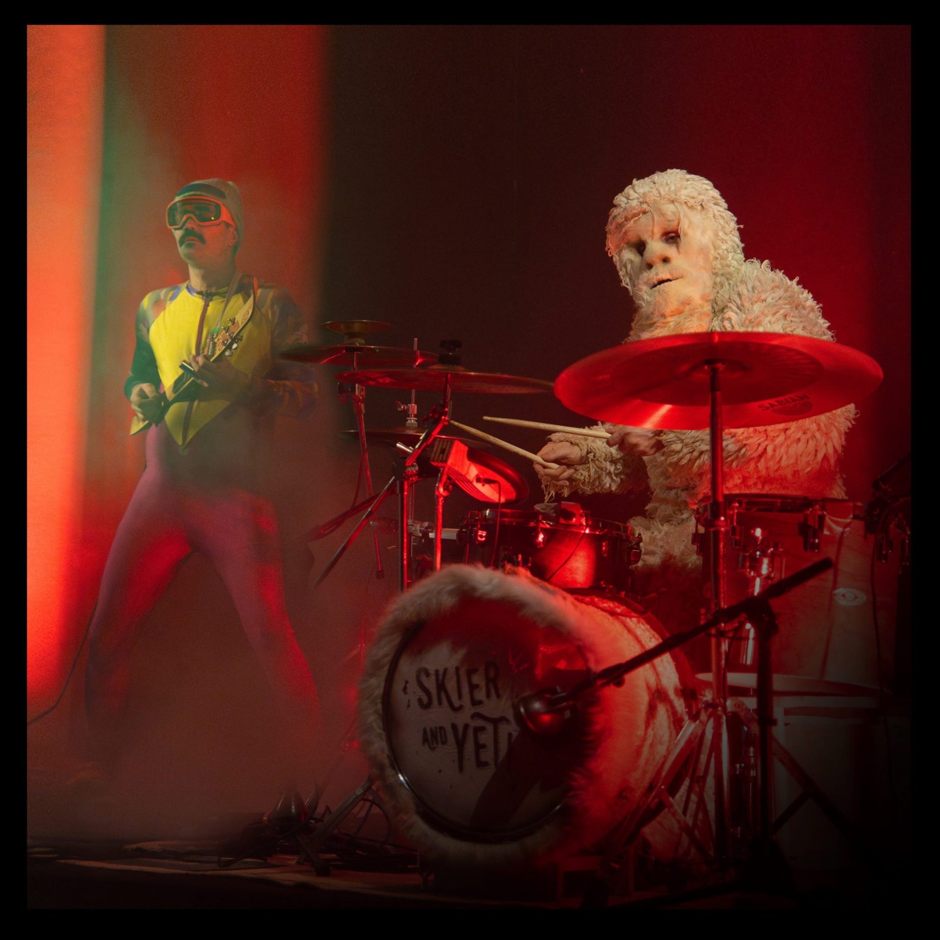 skier and yeti